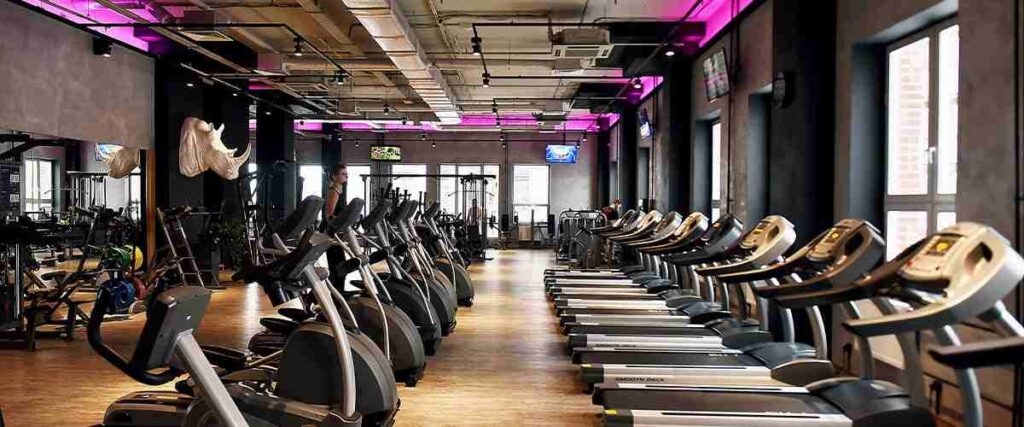 Inside of a gym with empty treadmills