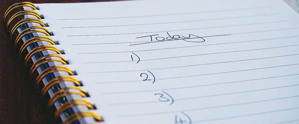 Open Notebook with Written "Today" with numbered blank list.