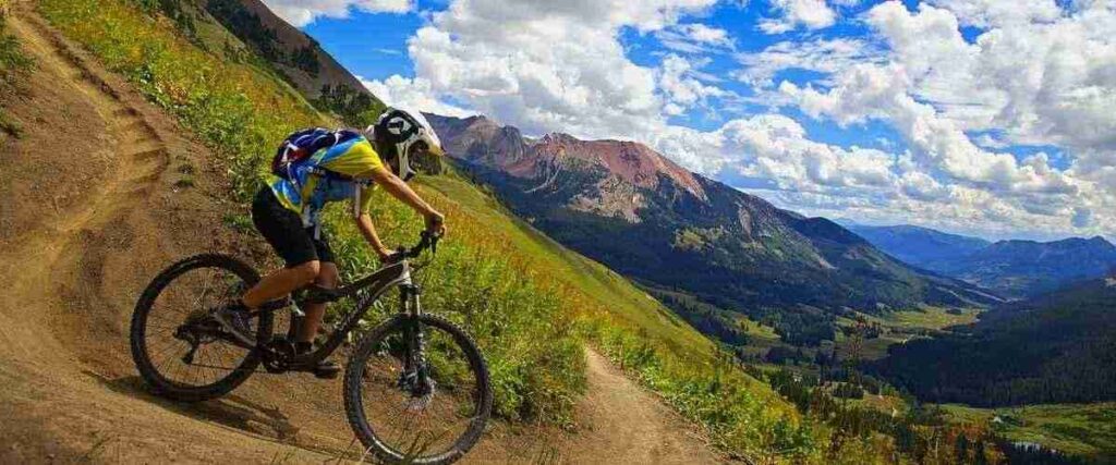 Mountain biker riding down the 401 Trail in Crested Butte.
