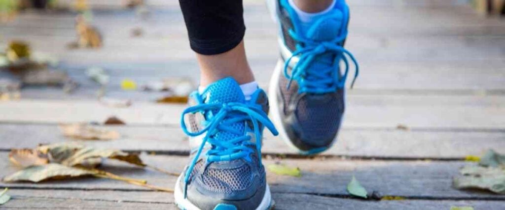 Close up of female running sneakers while running. 