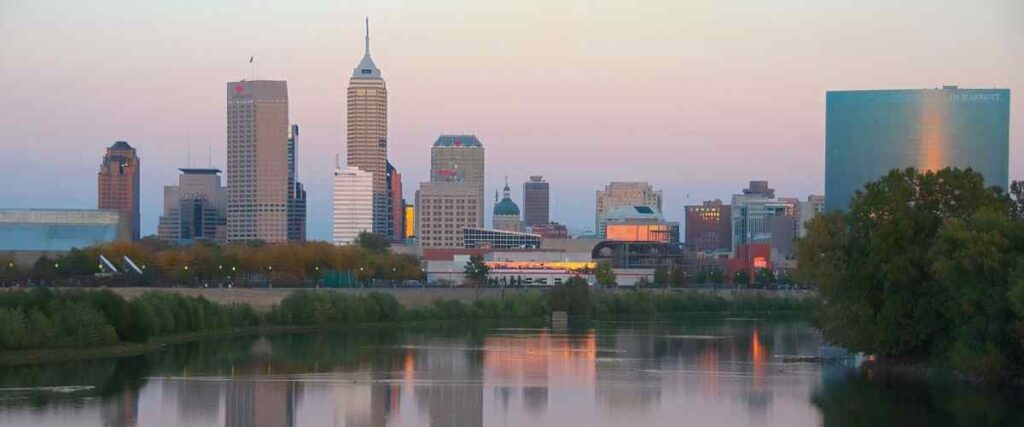 View of Indianapolis skyline at sunset. 