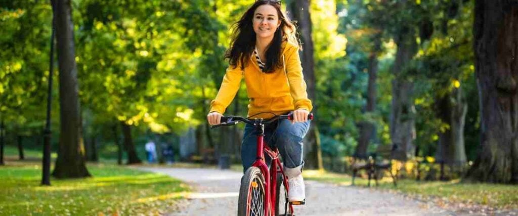 Female cycling at the Lafitte Greenway in New Orleans.