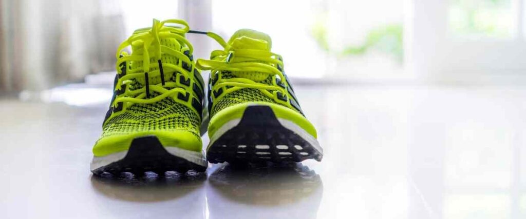 Close-up of neon green running shoes. 