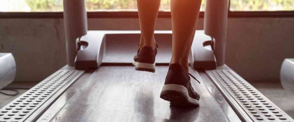Female runner on treadmill.