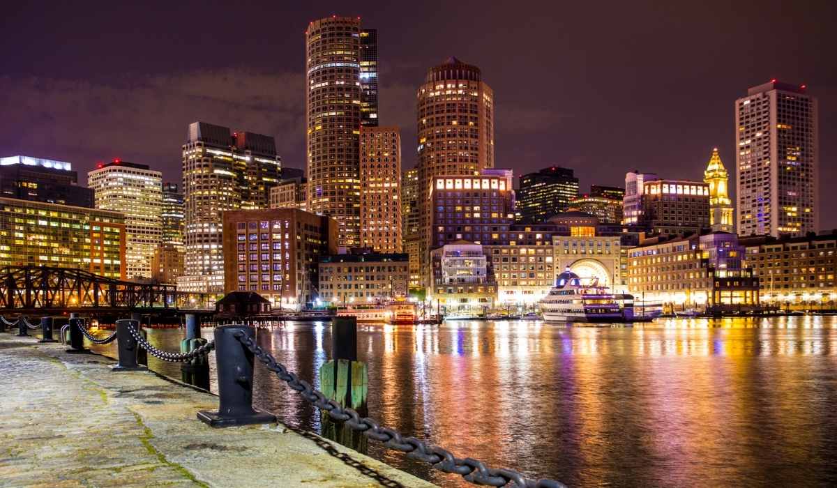 View of downtown Boston at night with the bright city lights. 