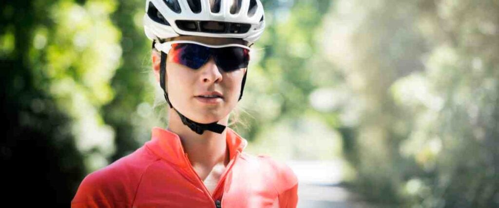 Women wearing helmet and cycling sun glasses