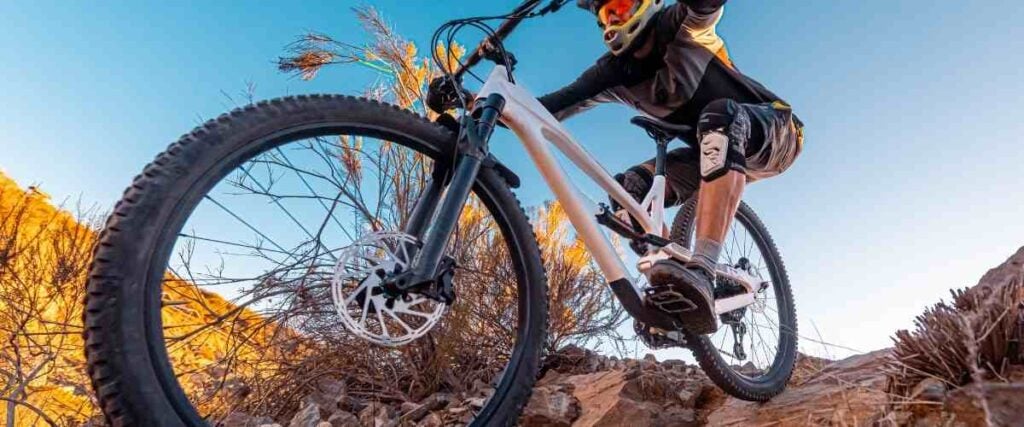 Mountain biker doing jump.