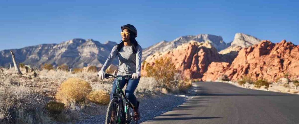 Female cyclists on trail.