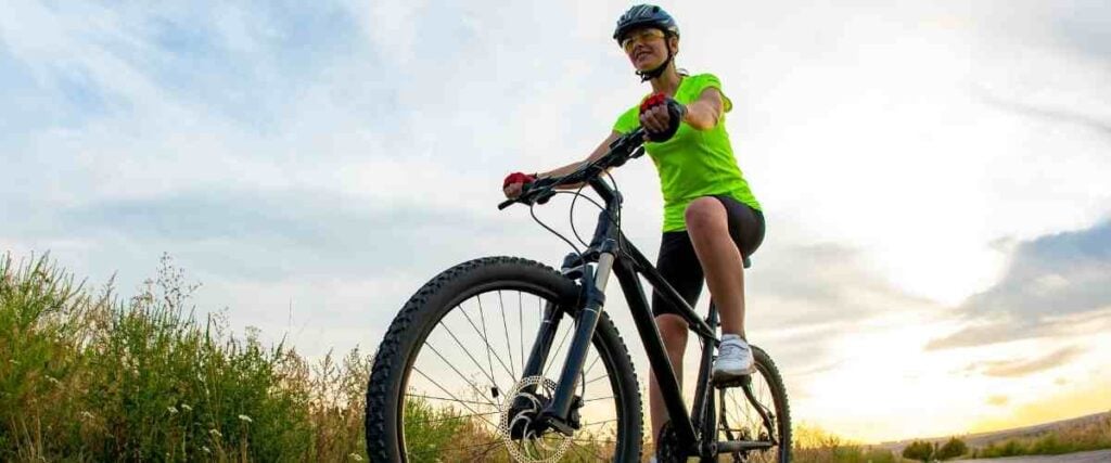 Female cyclists on trail.