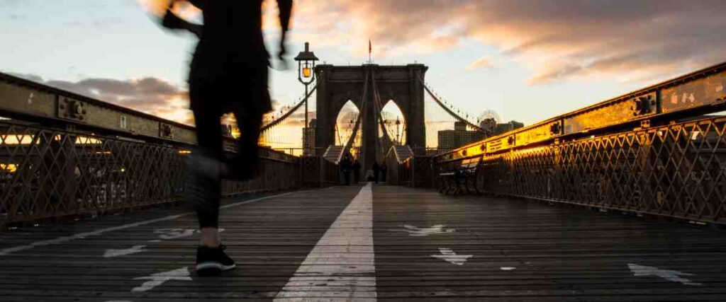 Running on bridge during sunrise.