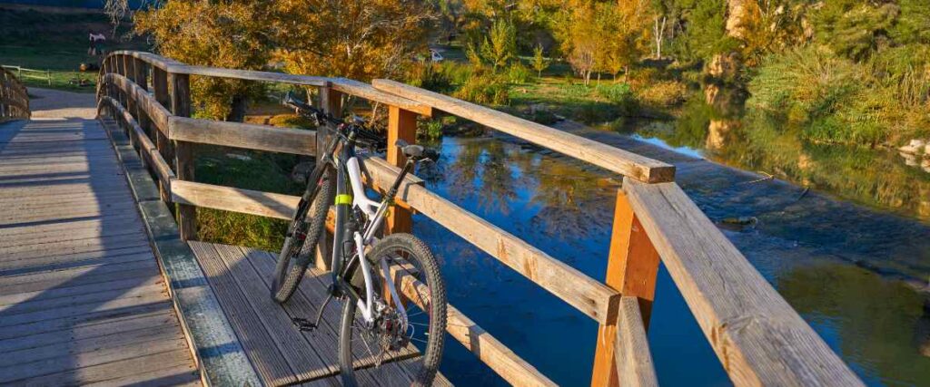 Bike parked on a wooden bridge at the Shelby Farms Greenline. 