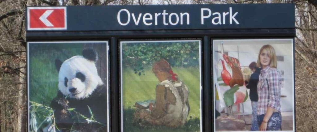 Overton Park sign with 3 different picture's, one of a panda, one of a painting and one of a woman shopping. 