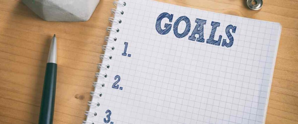 Graph paper with 'Goals' written at the top and number 1-3. 