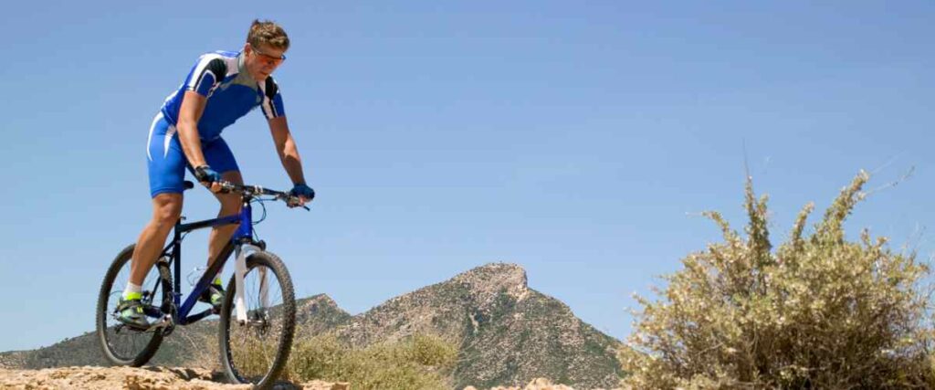 Cyclists on the Tortugas Mountain in New Mexico.