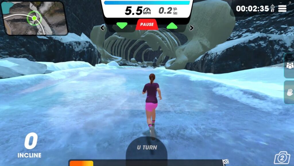 Female running avatar in Vingo running on the Ice Stomp trail with a cave ahead.  