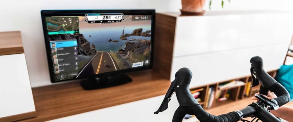 A user on their indoor bike while using Vingo on their tv screen. 