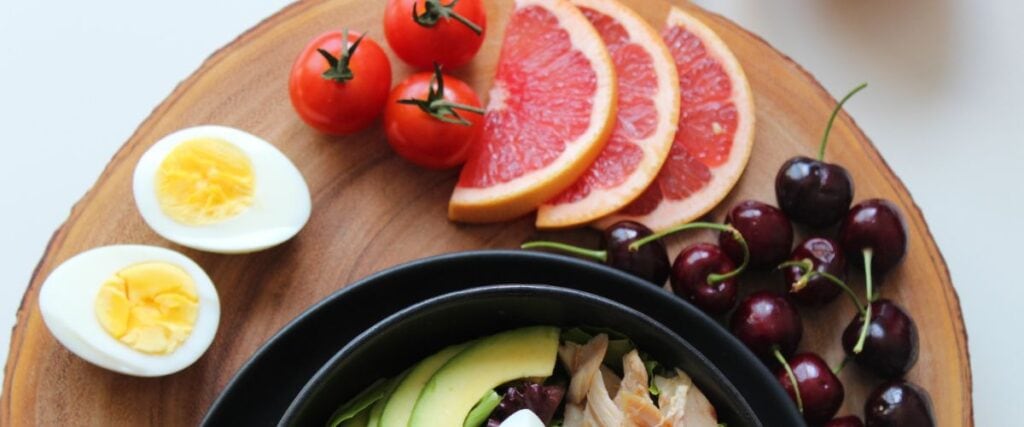 A plate full of heathy fruits and vegetables.