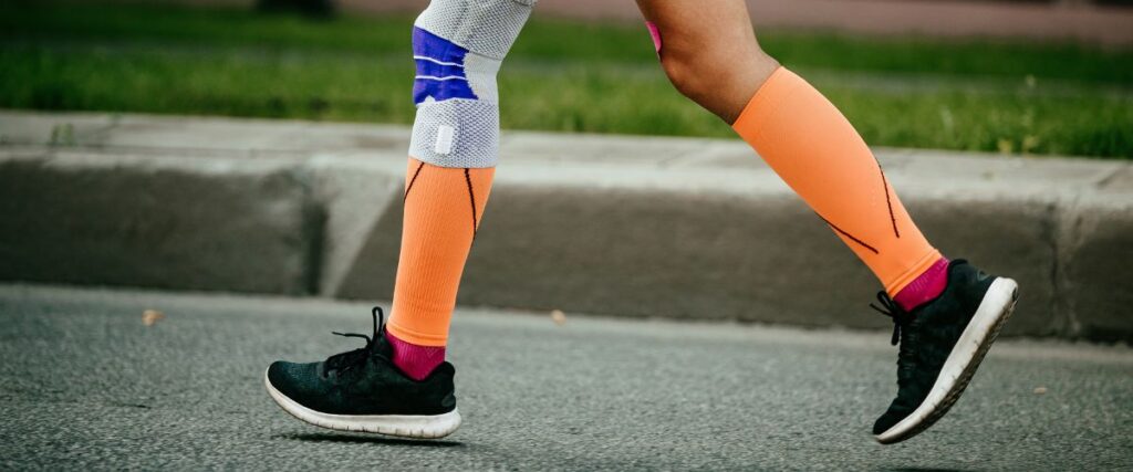 A runner wearing compression socks. 