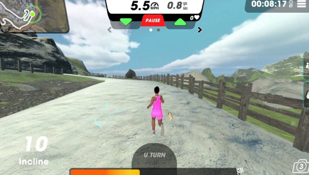 View 3 of female running avatar on Hillside Stride route running next to a fence overlooking water and mountains. 