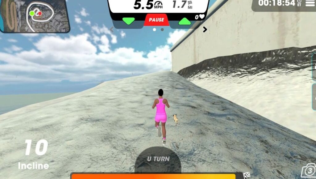 View 3 of female running avatar on Hillside Stride route running next to large wall. 